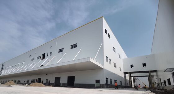 Disassemblable Steel‑structure Workshop Metal Frame Factory Building Clear‑span Warehouse Suitable For Manufacturing Storage And Commercial Showroom